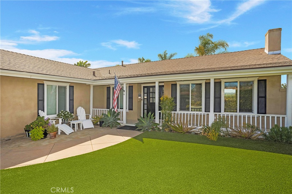 25222 Del Rio Laguna Niguel, CA 92677 - Photo 3 of 37 a front view of a house with garden