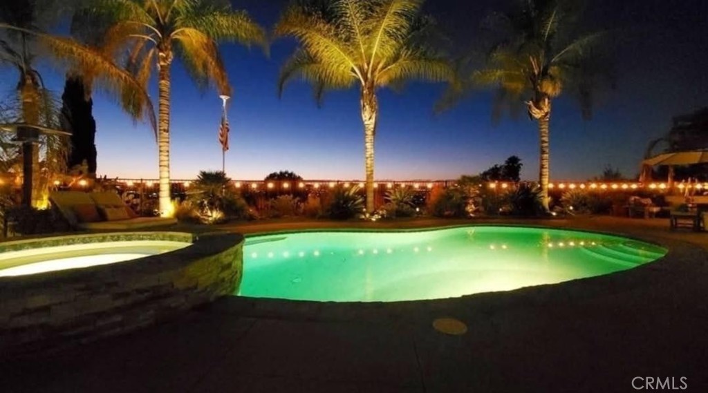 25222 Del Rio Laguna Niguel, CA 92677 - Photo 34 of 37 a view of an swimming pool with an outdoor space and seating area