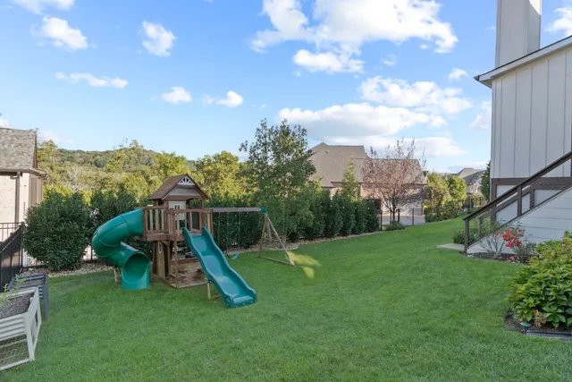 a view of a garden with a slide