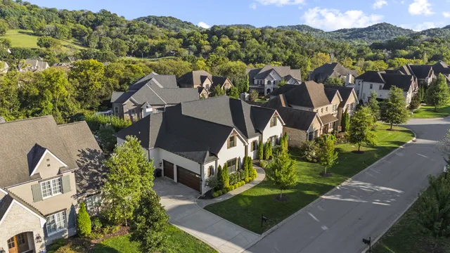 an aerial view of a house with a garden