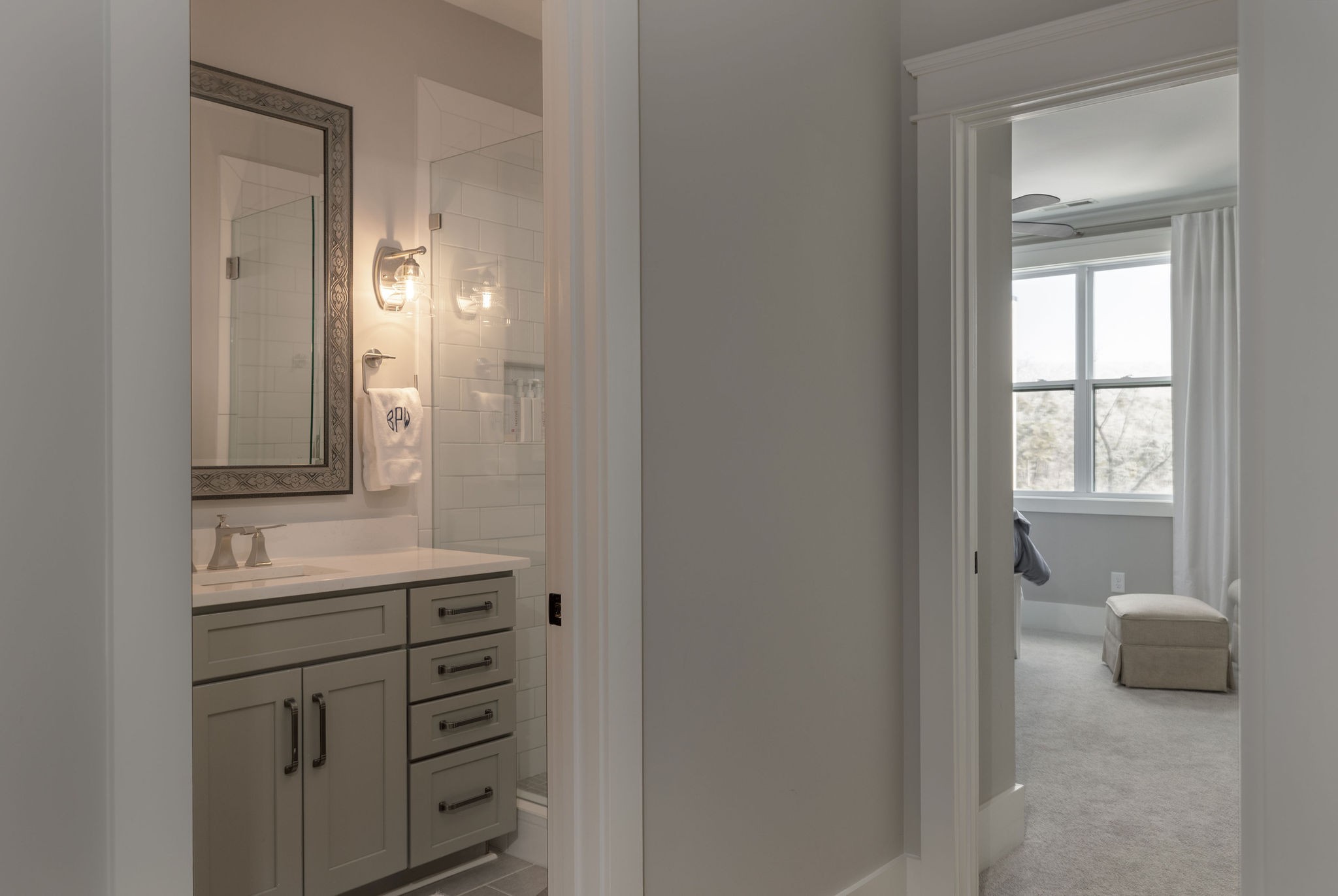 2186 Hartland Road Franklin, TN 37069 - Photo 63 of 74 a bathroom with a sink a light fixture and a mirror