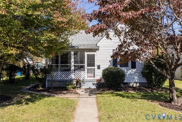 a house with trees in front of it