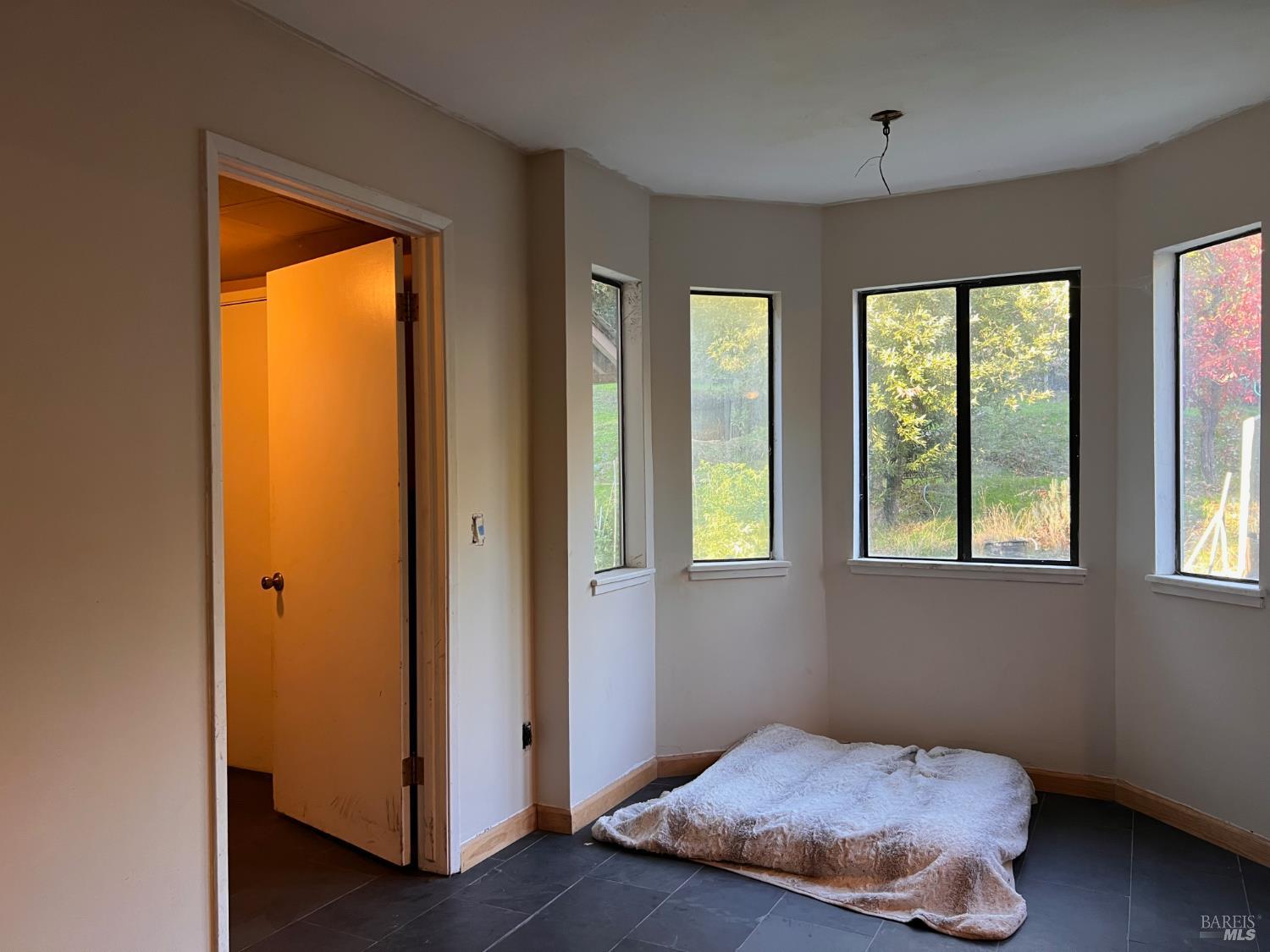 46720 Fox Rock Road Laytonville, CA 95454 - Photo 14 of 24 a bedroom with bed and window