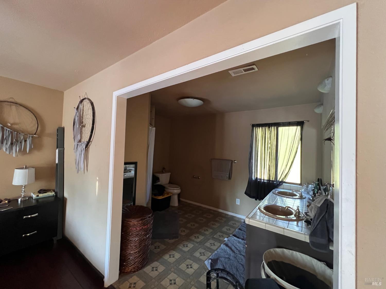 46720 Fox Rock Road Laytonville, CA 95454 - Photo 22 of 24 a room with furniture and a wooden door