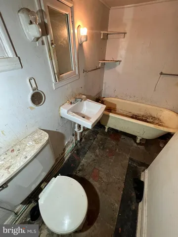 a kitchen with a stove and a sink