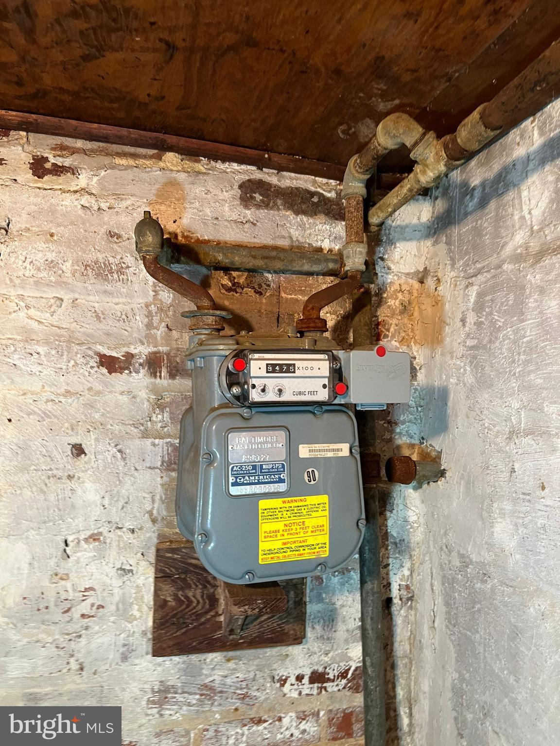 3421 St Ambrose Avenue Baltimore, MD 21215 - Photo 64 of 64 a view of a fireplace with a wooden table