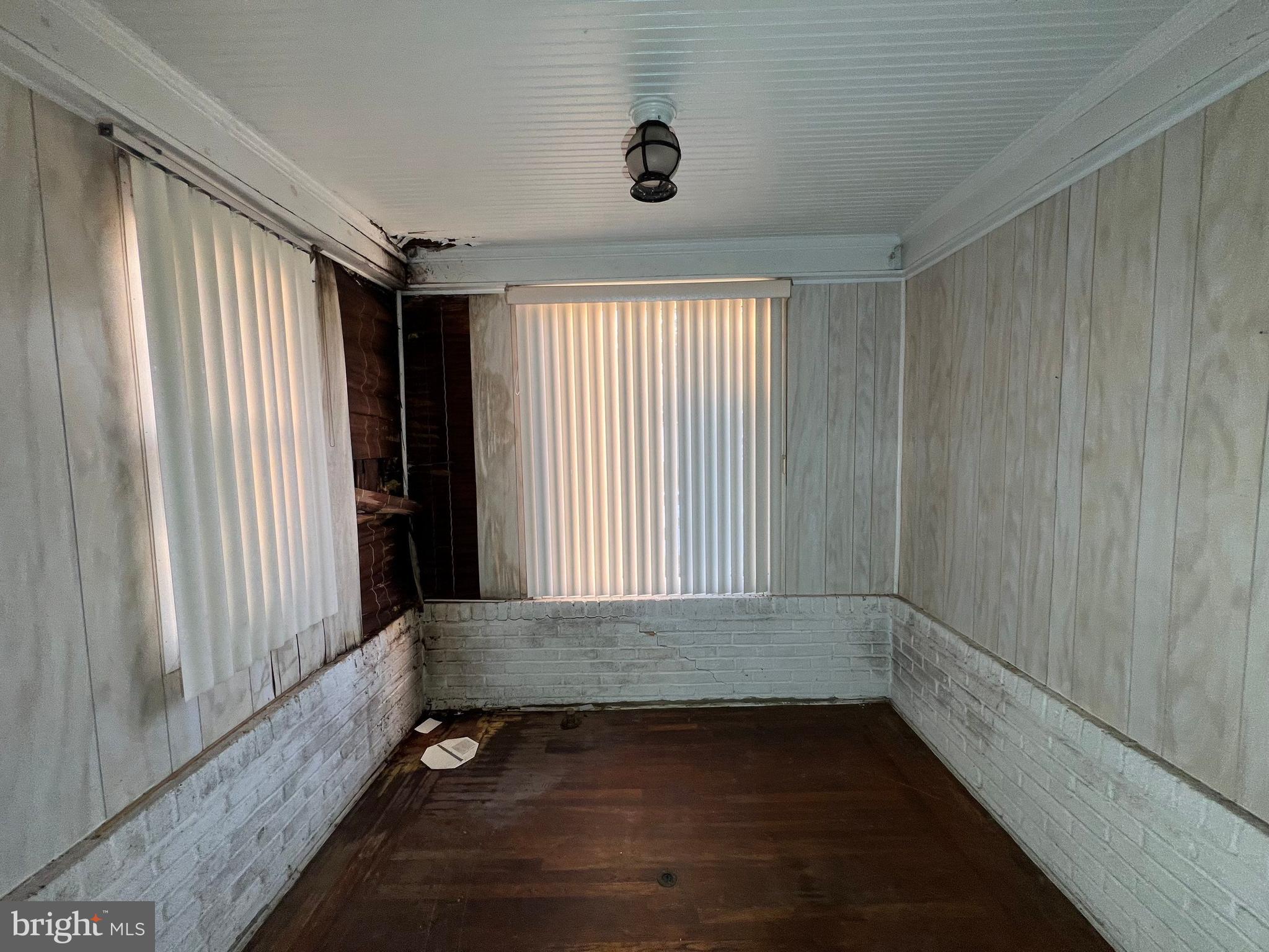 3421 St Ambrose Avenue Baltimore, MD 21215 - Photo 10 of 64 a view of an empty room with a window