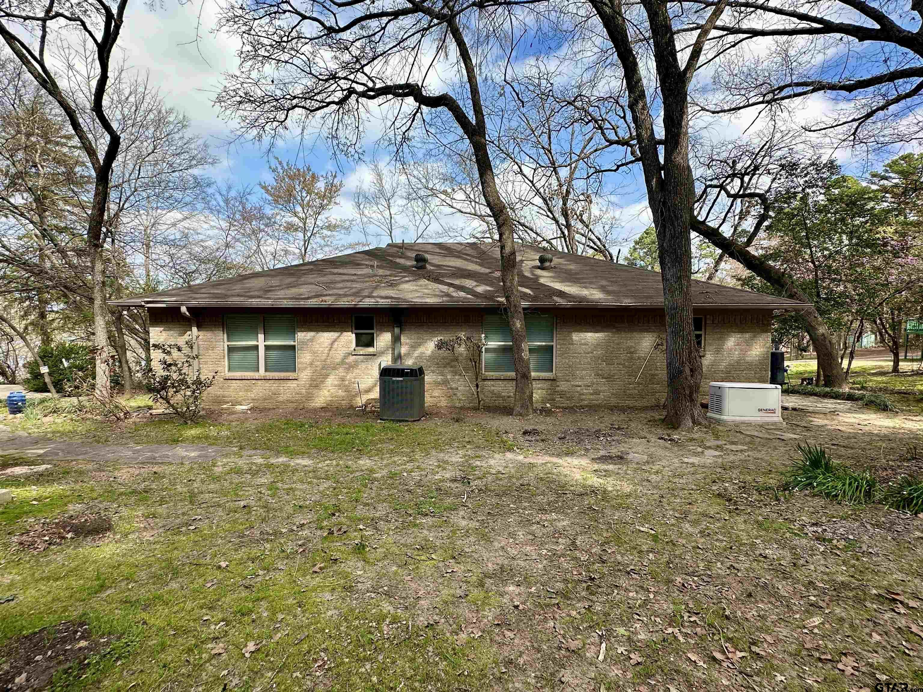 17035 Deer Run Road Flint, TX 75762 - Photo 16 of 31 a view of a house with a yard