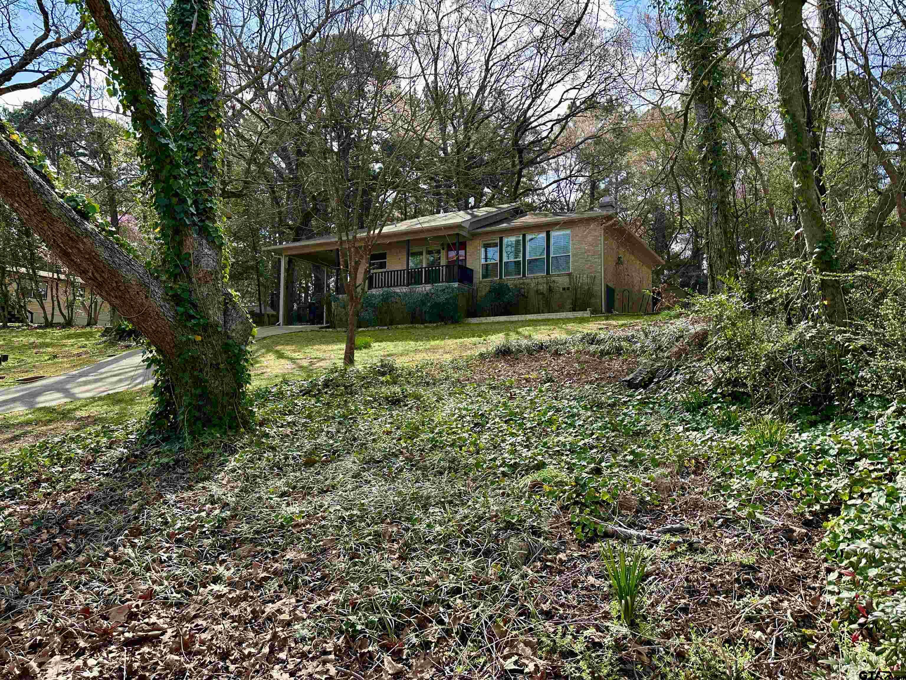 17035 Deer Run Road Flint, TX 75762 - Photo 31 of 31 a front view of a house with a yard