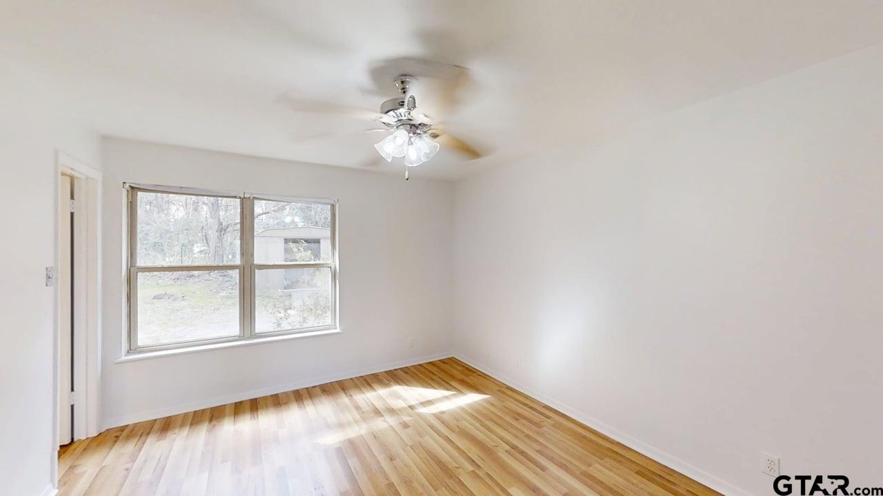 17035 Deer Run Road Flint, TX 75762 - Photo 10 of 31 an empty room with a window