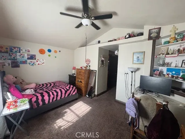 a view of a lake with couches and wooden floor