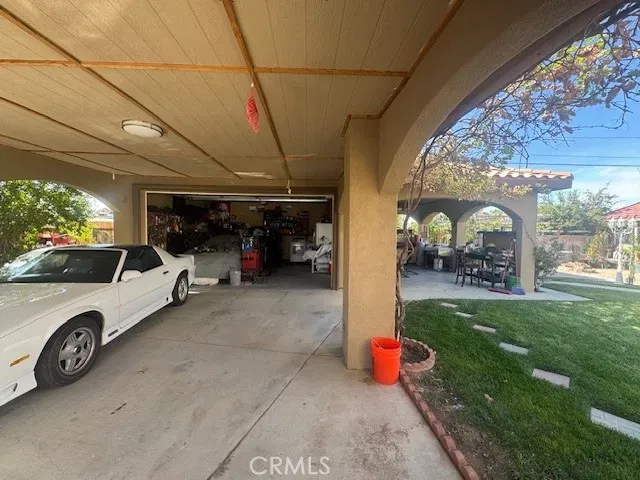 a view of a pathway with a yard