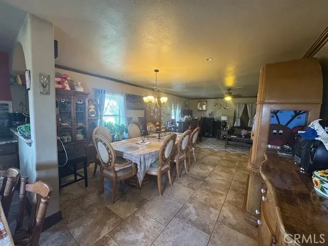 a lobby with furniture and floor to ceiling window