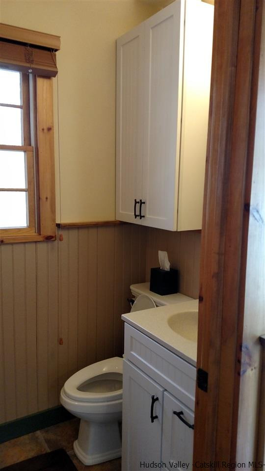 148 Pantherkill Road Phoenicia, NY 12464 - Photo 20 of 23 a bathroom with a sink a toilet and a window