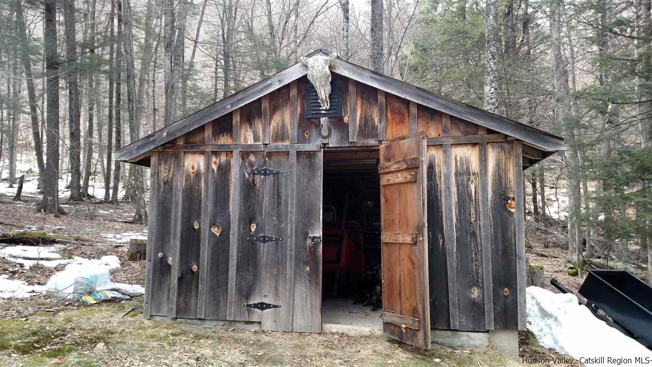 148 Pantherkill Road Phoenicia, NY 12464 - Photo 23 of 23 a wooden door with a outdoor space