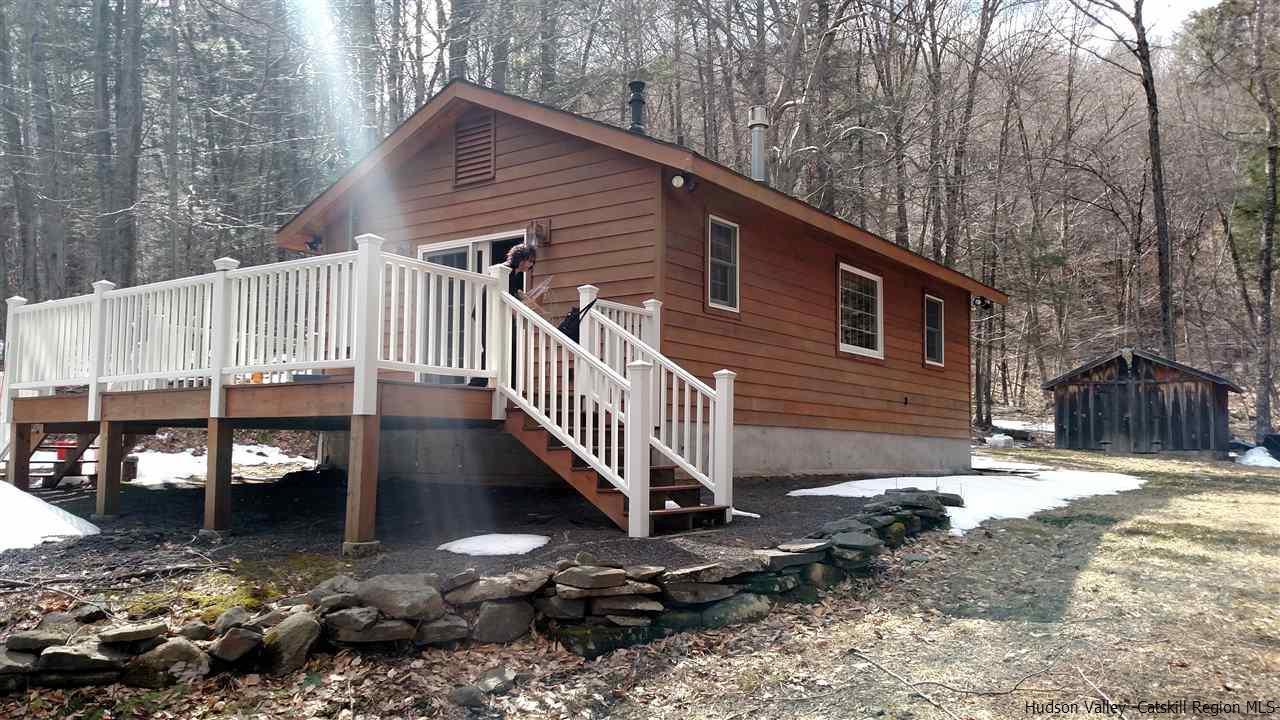 148 Pantherkill Road Phoenicia, NY 12464 - Photo 3 of 23 a house with trees in the background
