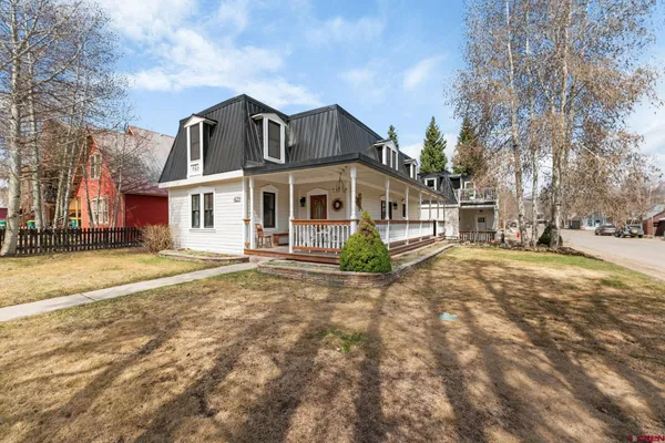 a view of a house with roof deck