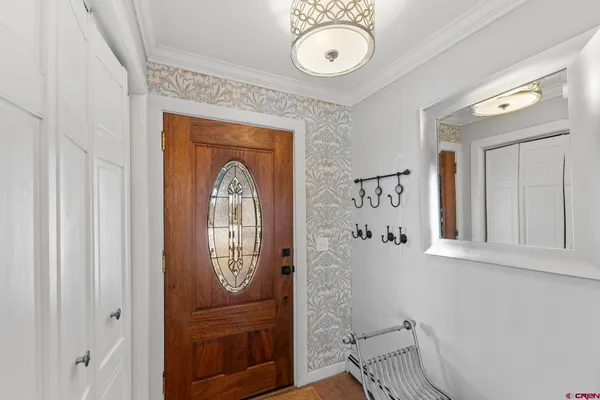 a view of a hallway with entryway