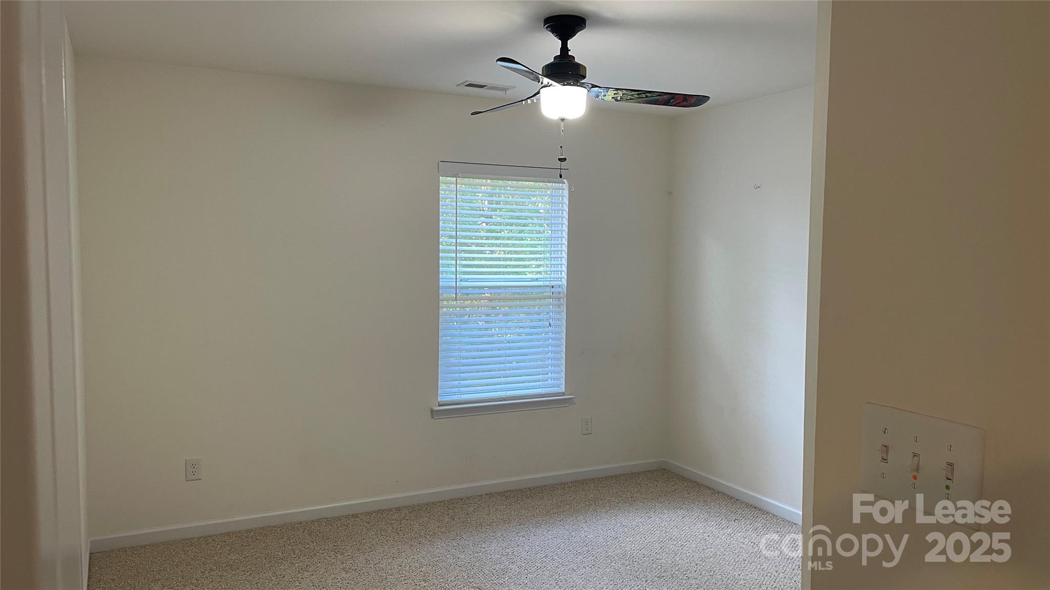 1010 Ashbin Court Fort Mill, SC 29707 - Photo 15 of 23 an empty room with windows and fan