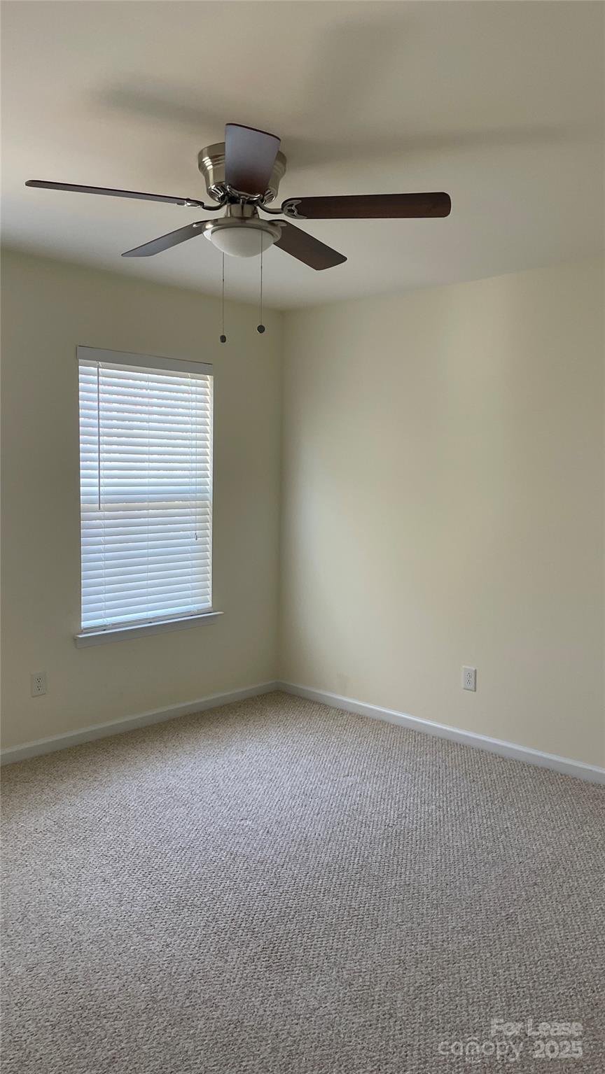 1010 Ashbin Court Fort Mill, SC 29707 - Photo 17 of 23 an empty room with a empty space and windows