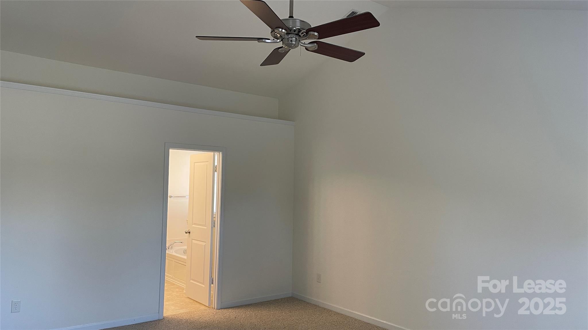 1010 Ashbin Court Fort Mill, SC 29707 - Photo 21 of 23 a view of a livingroom with a ceiling fan and window
