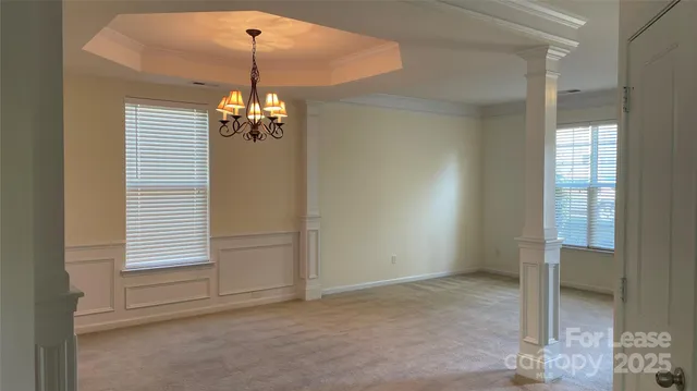 a kitchen with kitchen island granite countertop stainless steel appliances cabinets a sink and a counter top space