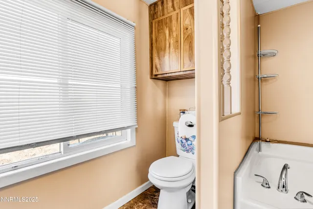 a bathroom with a sink and a toilet