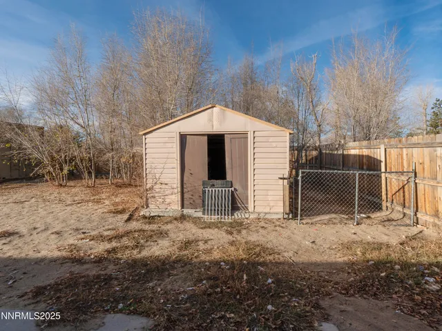 a front view of a house with backyard