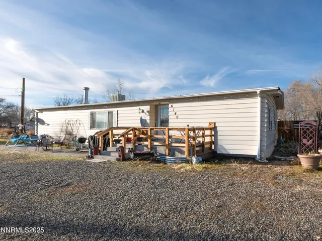 a view of a garage with parked cars