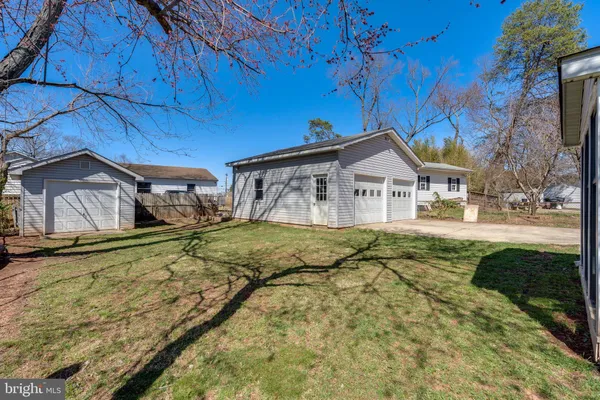 a house with trees in the background