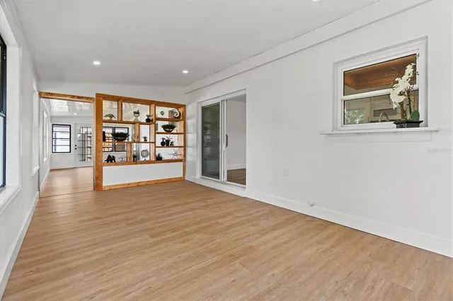 a bathroom with a granite countertop sink toilet and a mirror