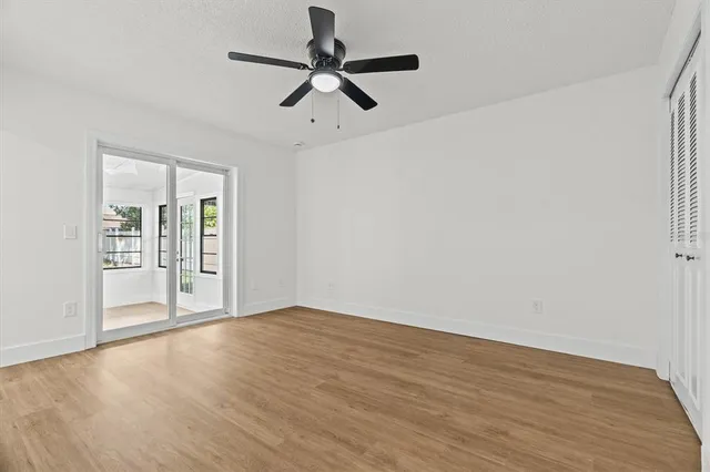 a view of a backyard with sitting area