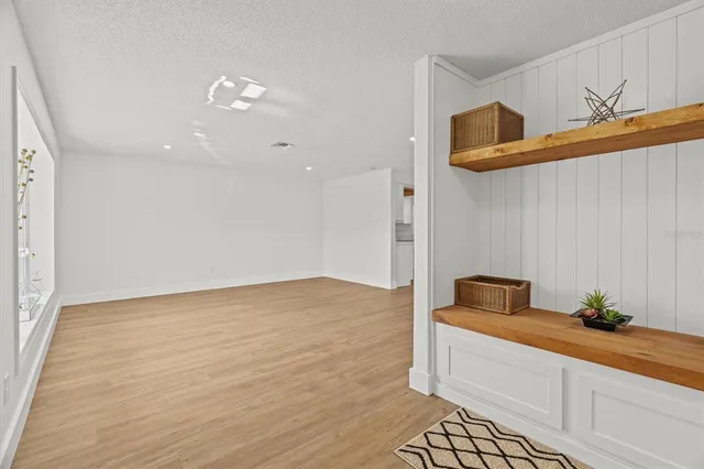 a room with a bed and couch