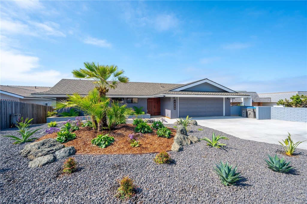 4865 Windsor Boulevard Cambria, CA 93428 - Photo 1 of 45 a front view of house with a yard