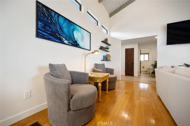 a living room with furniture and windows