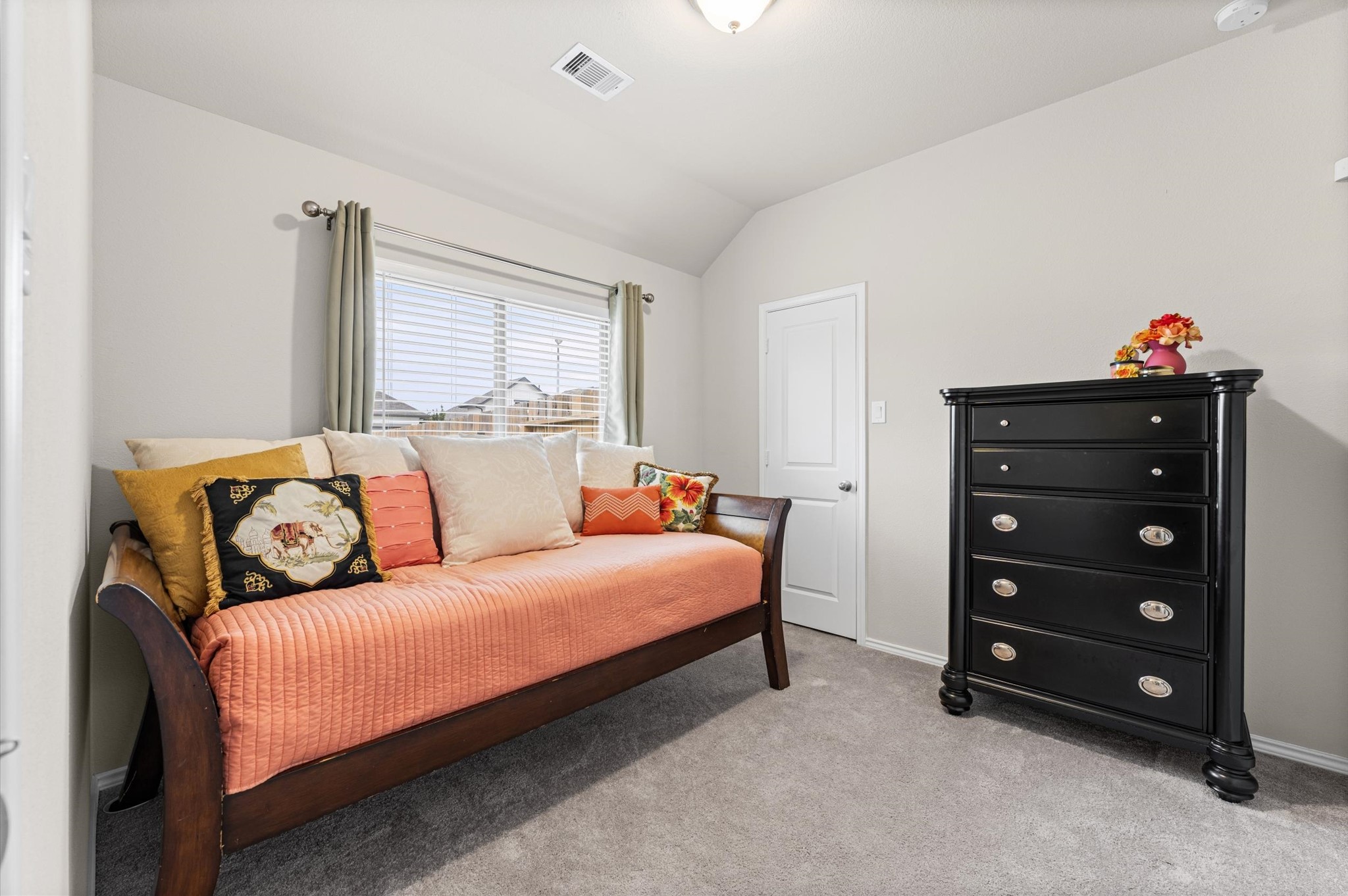 2702 Meadow View Lane Conroe, TX 77385 - Photo 6 of 26 a bedroom with a bed and a closet