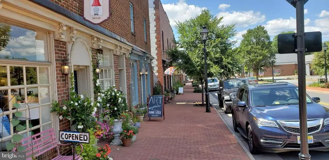 a view of a building with sitting area