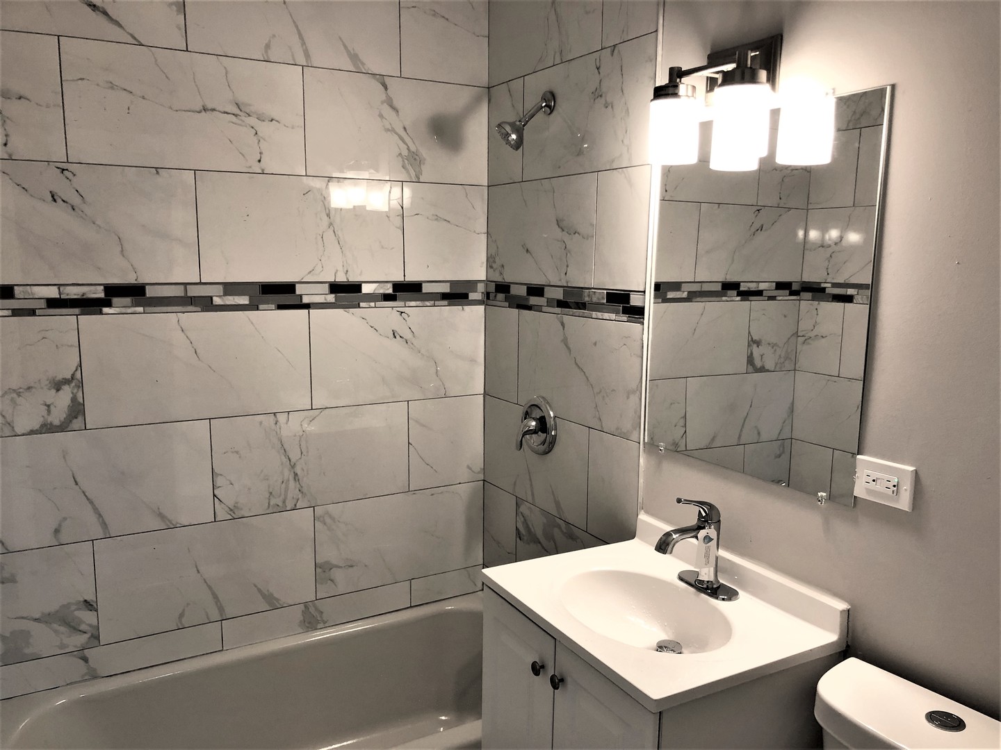6360 Long Avenue Chicago, IL 60638 - Photo 13 of 29 a bathroom with a sink toilet and shower