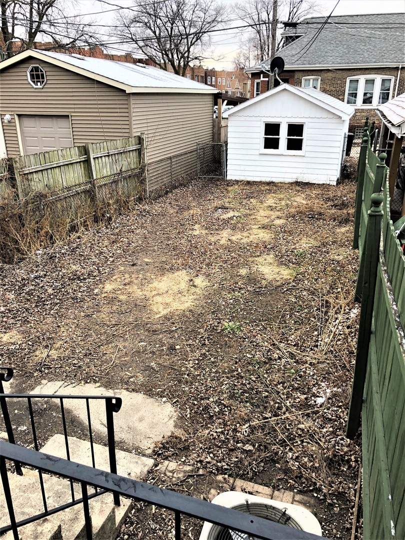 6360 Long Avenue Chicago, IL 60638 - Photo 24 of 29 a view of a house with a yard
