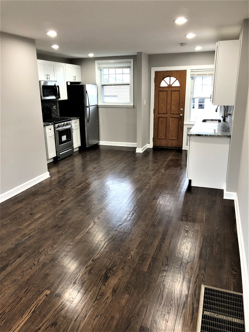 6360 Long Avenue Chicago, IL 60638 - Photo 5 of 29 a view of kitchen with cabinets and wooden floor