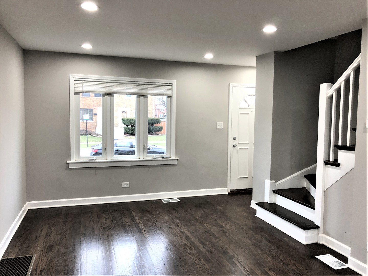 6360 Long Avenue Chicago, IL 60638 - Photo 10 of 29 an empty room with wooden floor and windows