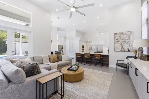 an aerial view of a houses with outdoor space and lake view