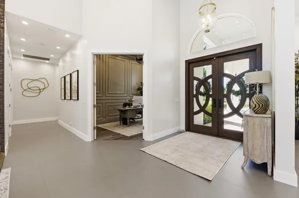 a view of a dining room with furniture and window