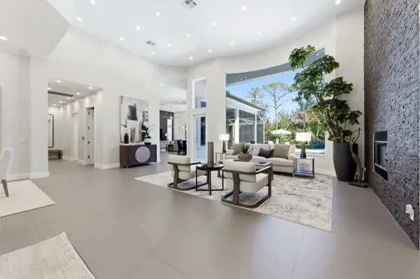 a view of a very nice looking dining room with furniture window and wooden floor