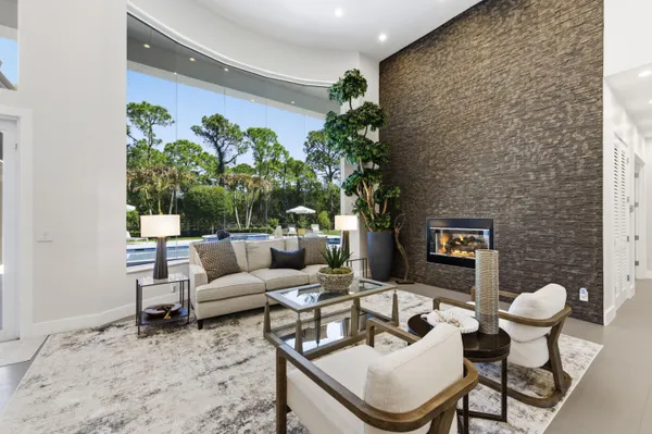 a view of a living room and entry way