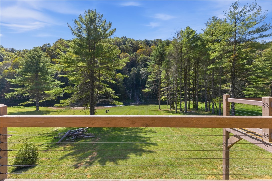 355 South River Hills Road Lansing, NC 28643 - Photo 36 of 45 a view of a yard with an outdoor space