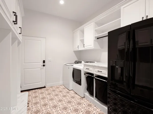 a kitchen with a stove and a refrigerator