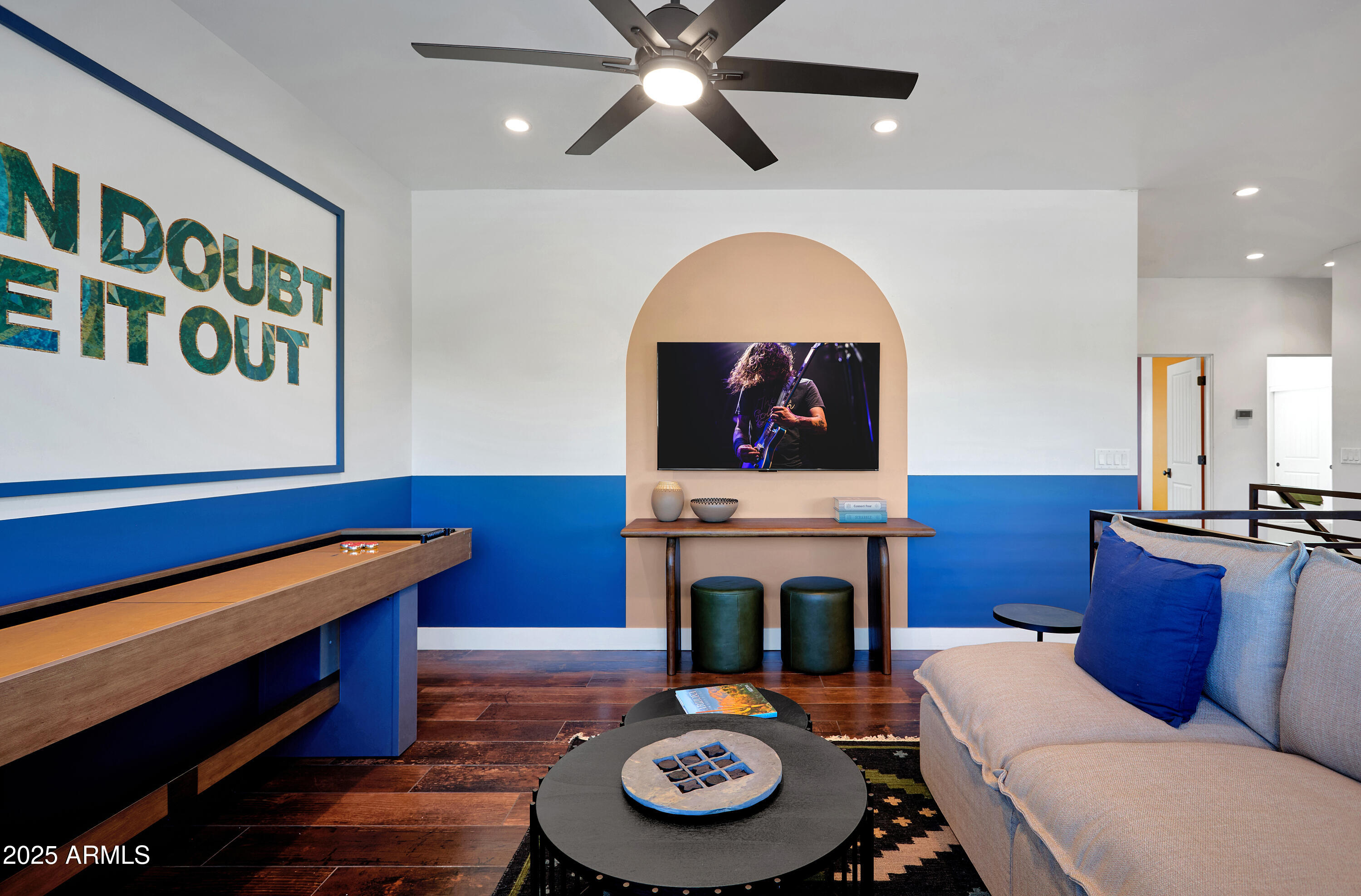3229 East Campbell Avenue Phoenix, AZ 85018 - Photo 17 of 44 a living room with furniture and a fireplace