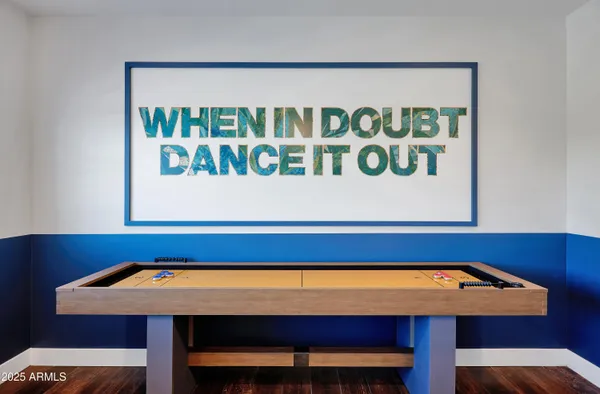 a room with a table and chairs