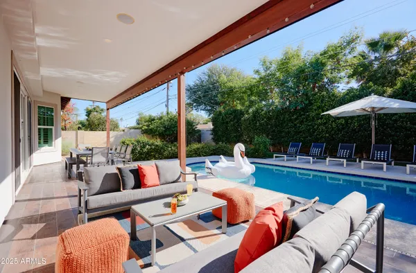 a outdoor living space with furniture and garden view